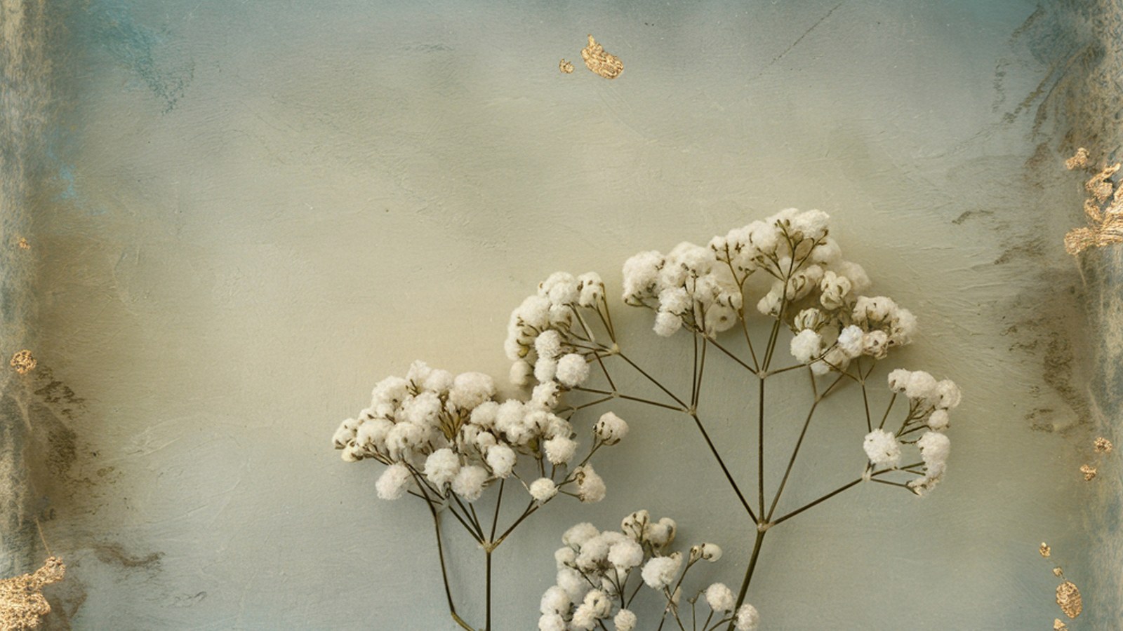 A Canva digital scrapbook page in progress, with floral papers and two framed photos